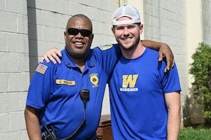 campus safety officer with student 300x200