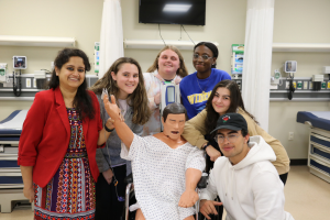 Widener students working in the nursing simulation lab