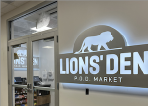 The outside of Lion's Den P.O.D. Market
