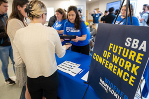 The lobby of Widener University's School of Business, with volunteers handling registration for a professional conference.