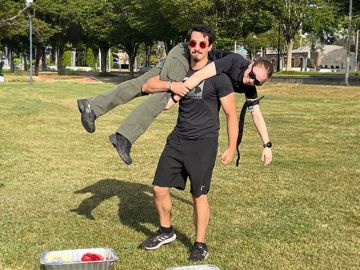 Nursing student Samuel Flood does a fireman carry during an on-campus emergency response workshop.