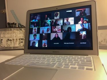 Open laptop showing virtual meeting of members of Widener's chapter of InterVarsity