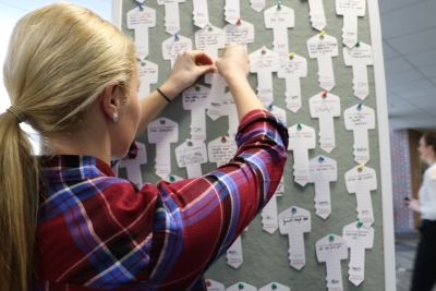 student at courage day key wall 