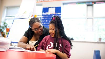 Elementary Education Teacher and Student