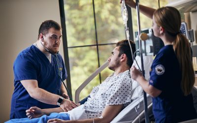 Widener School of Nursing Students practice patient care in simulation lab. If you're looking for one of the best nursing schools in Pennsylvania, come and explore Widener.