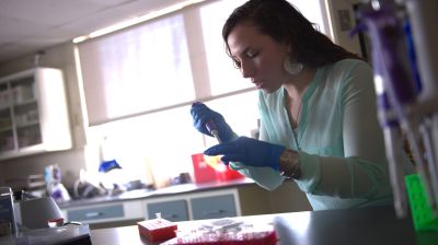 Pre-health care pathway student in lab