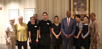 Hospitality management students pose with Superintendent Dr. Juan Baughn and Rev. Jennifer Casey