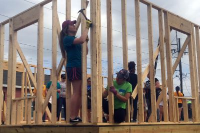Sisters Emily and Sarah Wright hammering on ASB worksite