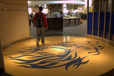 Student walking into the Pride Cafe