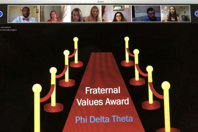 Zoom call with 6 people visible at top and graphic slide of a red carpet