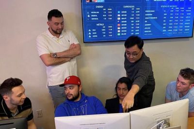 Students and faculty use Bloomberg computer terminals in the Finance Lab