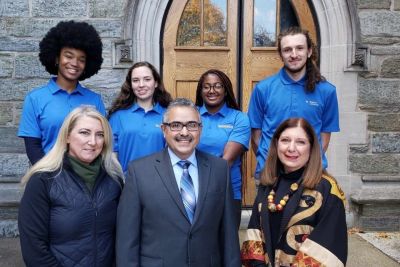 Widener social work faculty and students stand with members of the PA Department of Aging following a press conference.