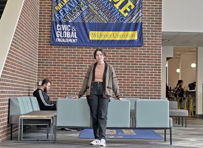 International student Shahinakhon Bahodirova poses in the University Center Atrium