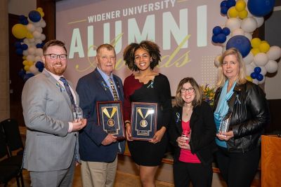 L to R: Ryan Raiker, Col. Tom Vossler, Donya Moore, Jill Borin, and Marcia Zaruba O’Connor pose with their awards.