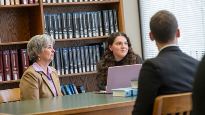 Widener University Delaware Law School students and faculty in the library.