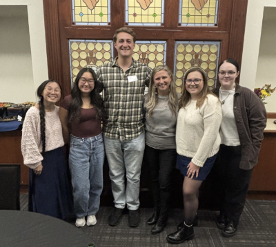 a group of students gather at a widener social work community belonging event