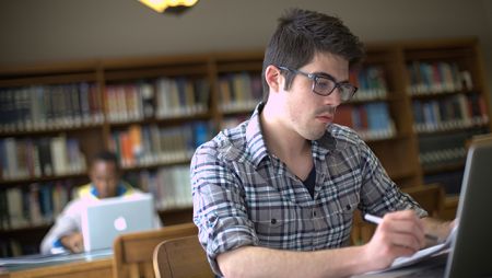 online student at library
