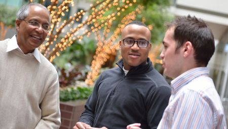 Students Talking with Professor