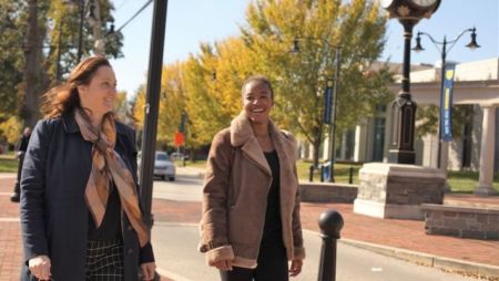 Crina Drayer walking around Widener's campus with transfer student.