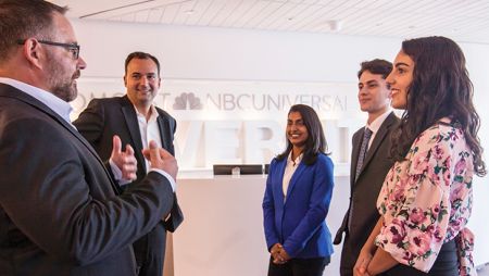 Widener's alumni that work at Comcast gather in conversation