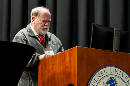 Joe Vaccaro speaks at the podium during the 2024 Voices From Freedom event
