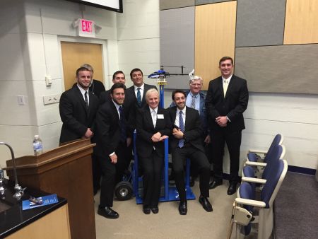 Rayd with faculty and students at senior project day in 2015