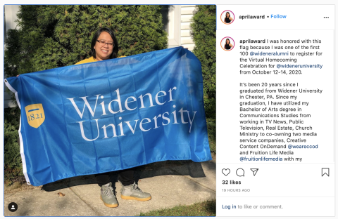 alumni holding widener university flag