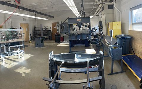 Mechanical Engineering Machine Shop contains a variety of tools and work stations.
