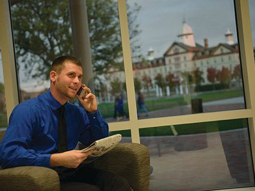 Grad Student MBA Old Main Phone 500x375 graduate student at night