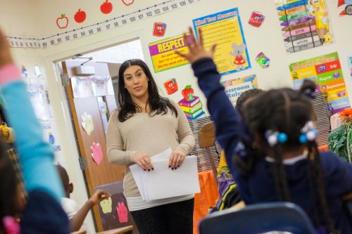 widener student teacher in elementary school classroom with students