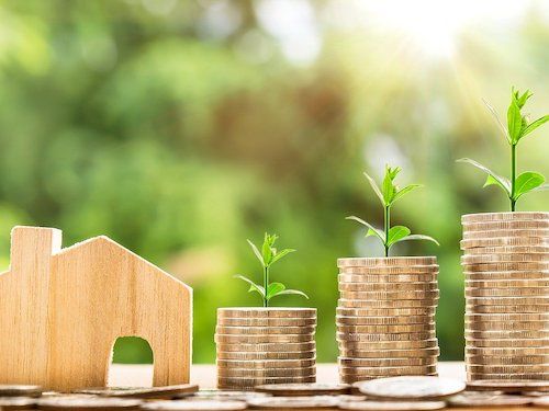 coins stacked indicating savings growth