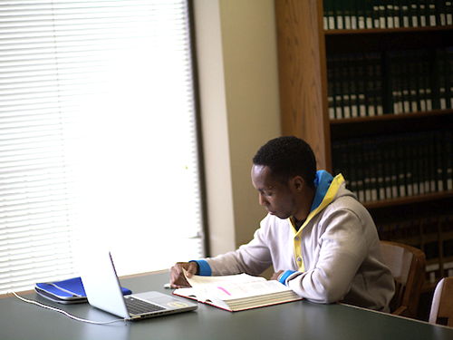 Student studying in library