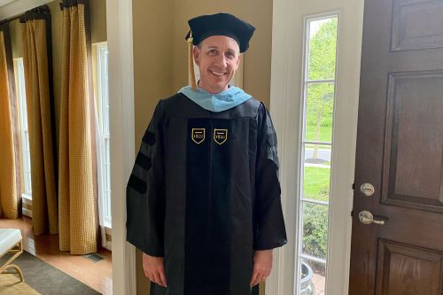 EdD graduate James Conley in his cap and gown