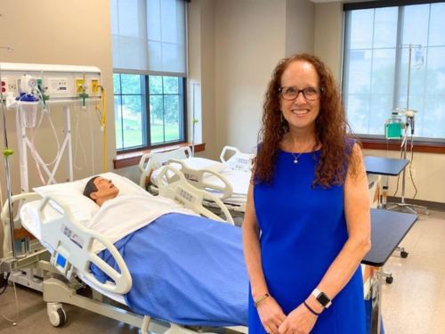 A photo of Audrey Snyder in the simulation lab in Founder's Hall