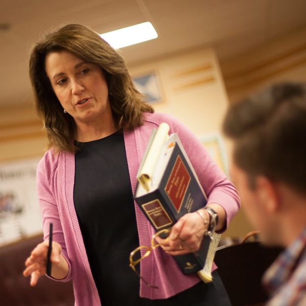 Law professor speaking with student