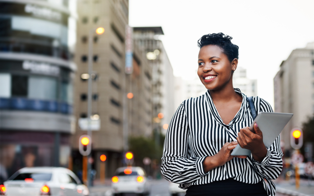 Professional MBA student walking in the city
