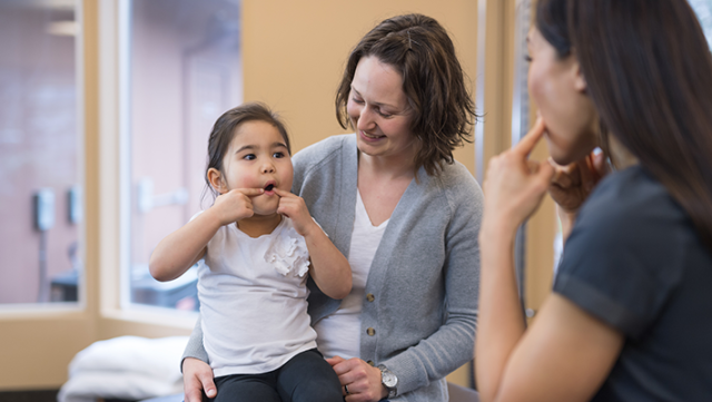 Speech-language pathologist with chil