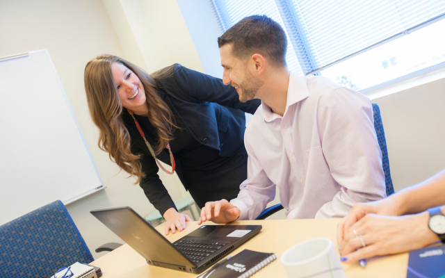 Business professionals in conference room 