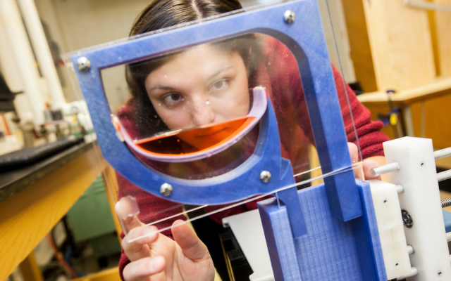 Engineering student conducting experiment in lab
