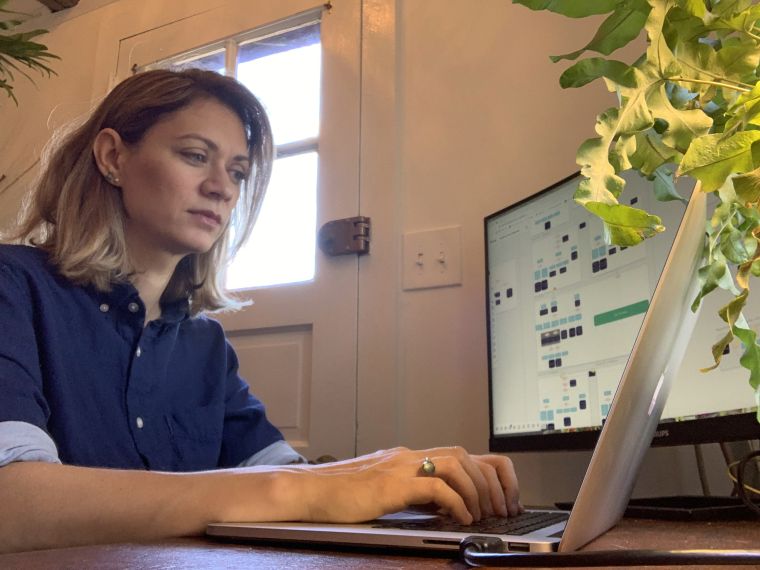 Jeanne McCarthy working at a computer