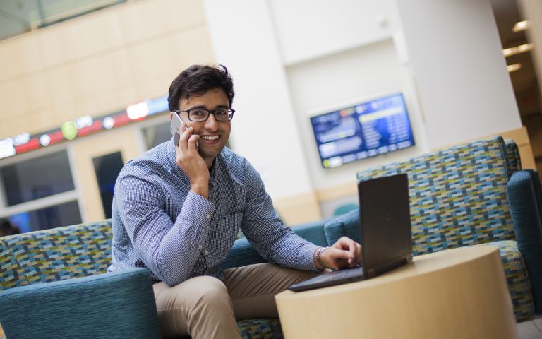 SBA Business Student on Phone