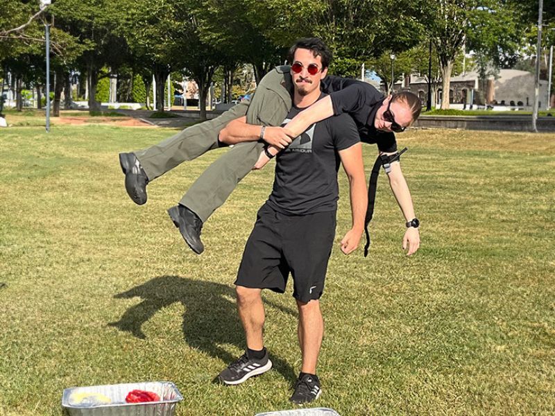 Nursing student Samuel Flood does a fireman carry during an on-campus emergency response workshop.