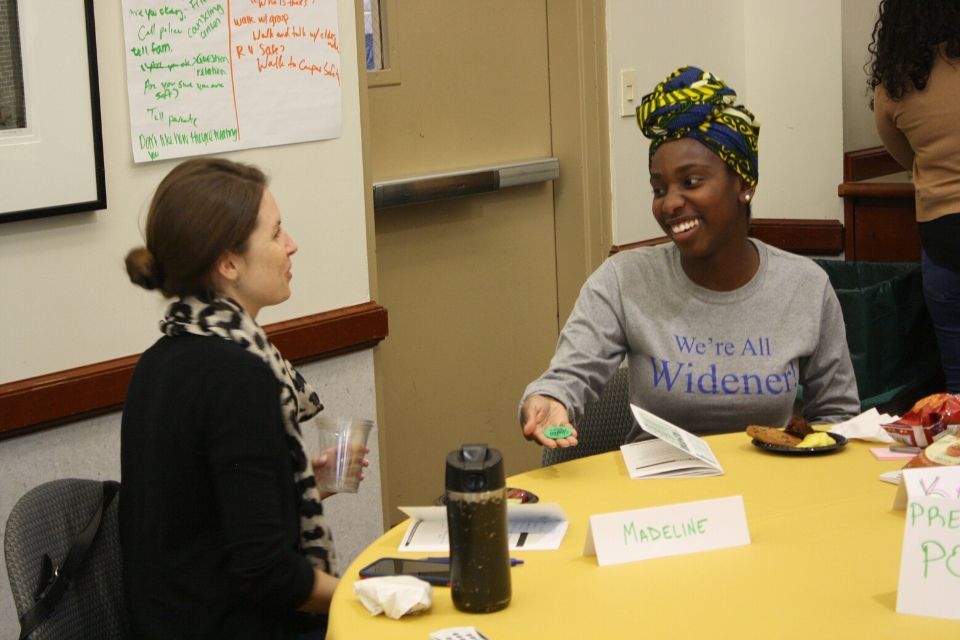 Participants talk at the Green Dot training