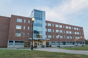 kirkbride hall entrance at night